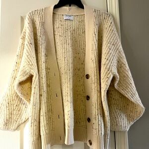 Beige cardigan. Very soft and comfortable.